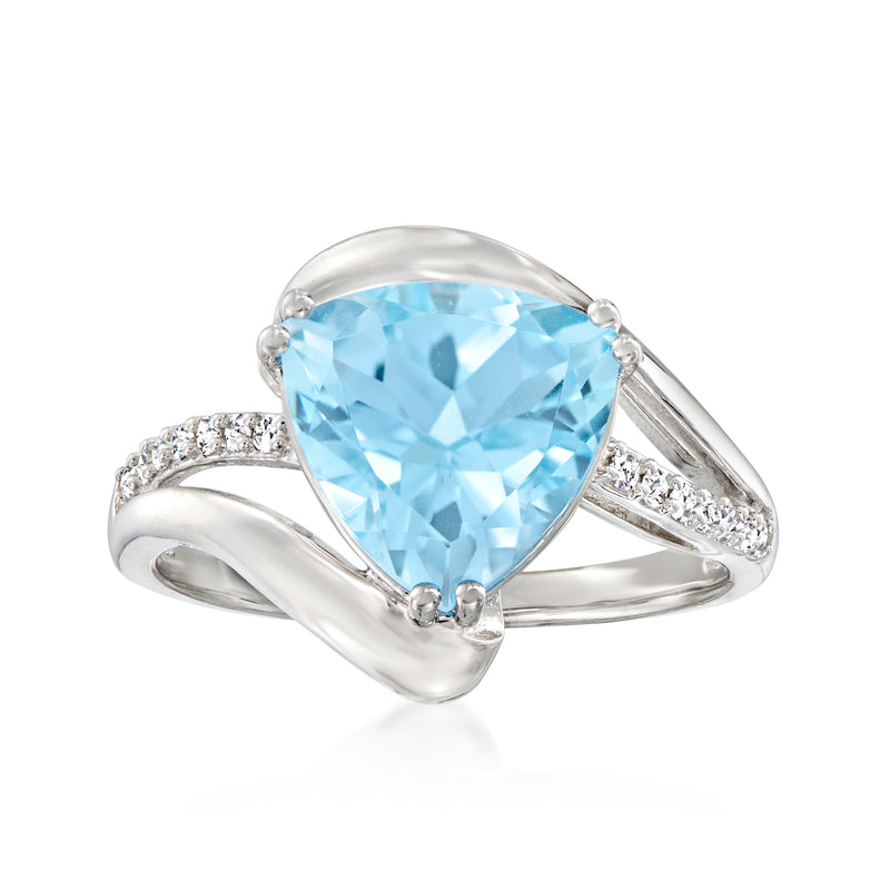 Sterling silver ring with oval sky blue topaz and diamond side accents