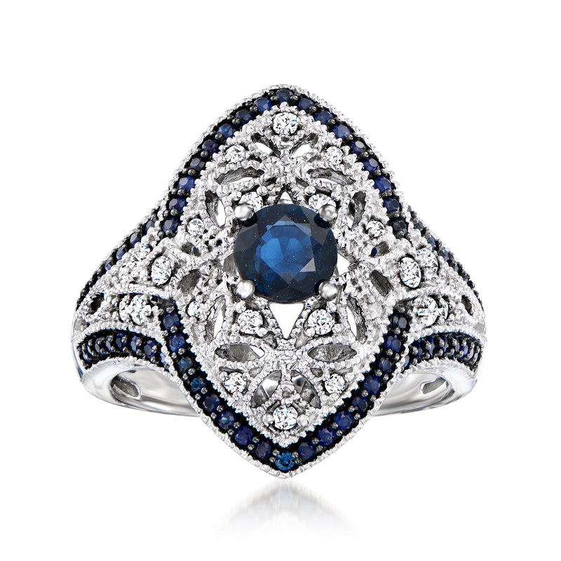 Sterling silver marquise ring with round blue sapphire and diamond halo, dark blue border