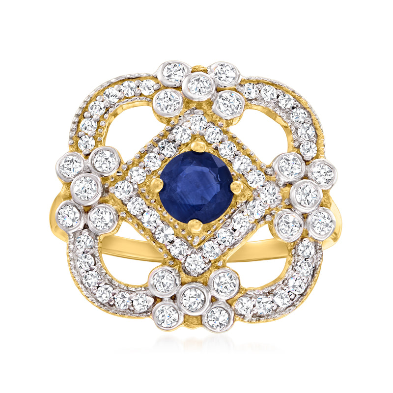 14kt yellow gold ring with blue sapphire center and round diamond halo