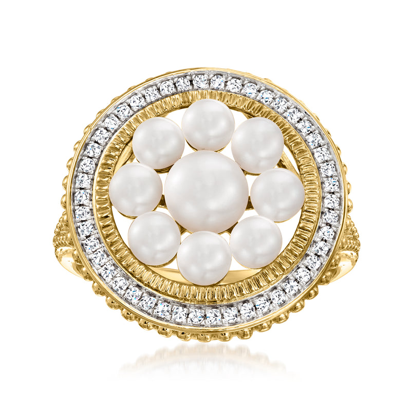 Gold ring with white cultured pearl cluster and clear stone halo