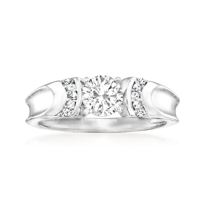 Sterling silver moissanite ring with round center stone and two side clusters