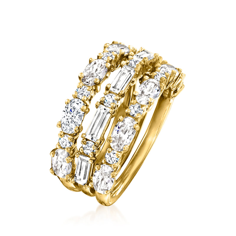 Gold-tone CZ ring with oval and baguette stones in a multi-row curved band