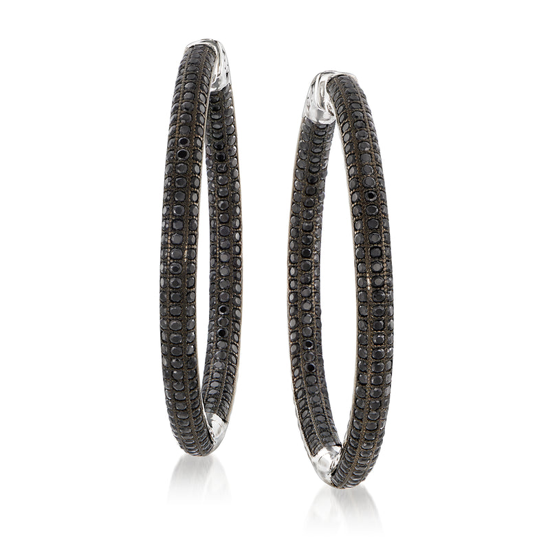 Sterling silver hoop earrings with black spinel inside-outside setting