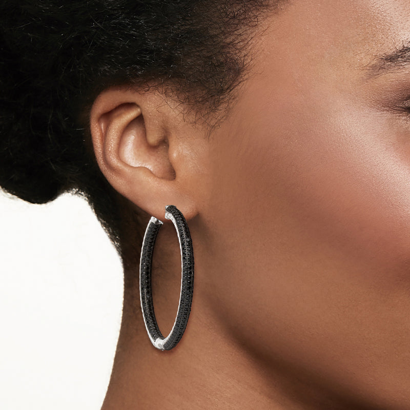 Sterling silver hoop earrings with black spinel accents