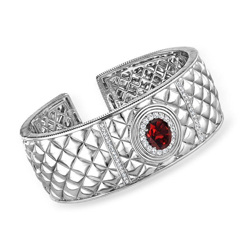 Sterling silver cuff bracelet with red garnet center and diamond-like sparkle trim
