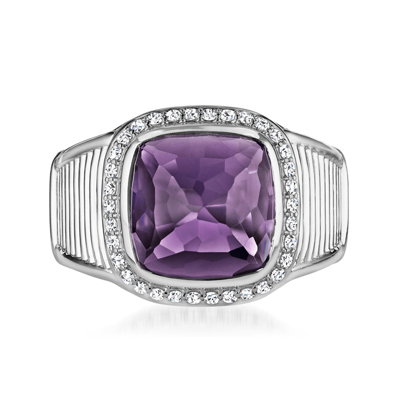 Sterling silver ring with oval amethyst center and diamond halo, with ribbed side accents