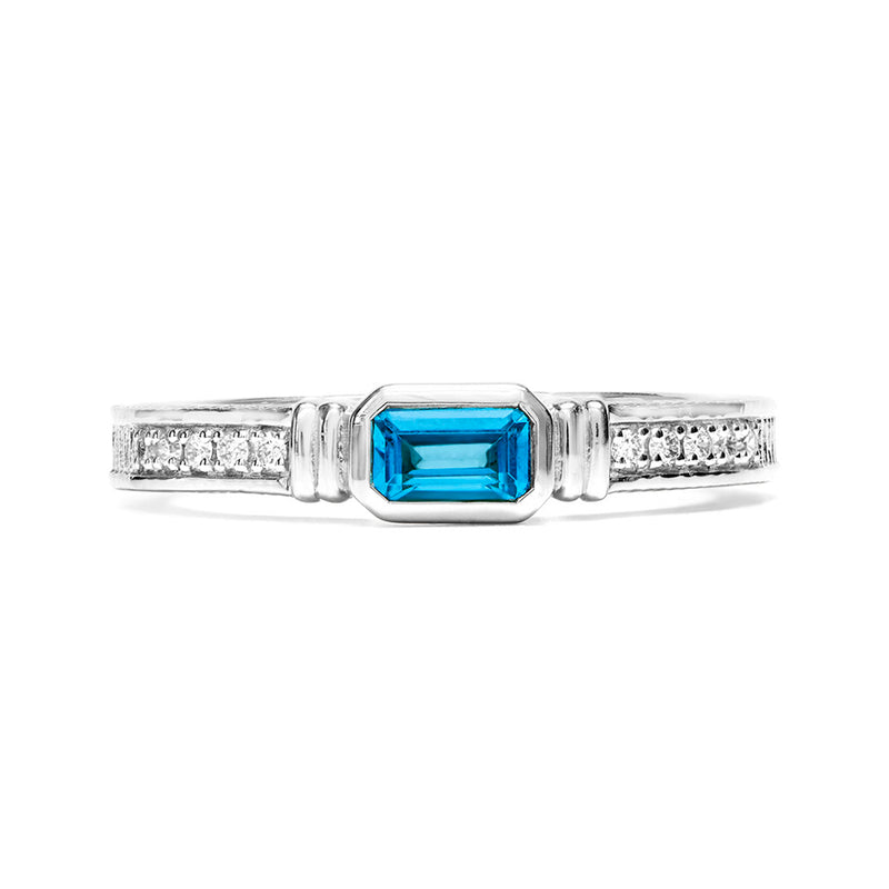 Sterling silver stackable ring with blue topaz square center and diamond accents