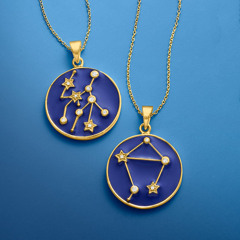 Set of two gold-tone zodiac constellation pendant necklaces with round blue enamel charms