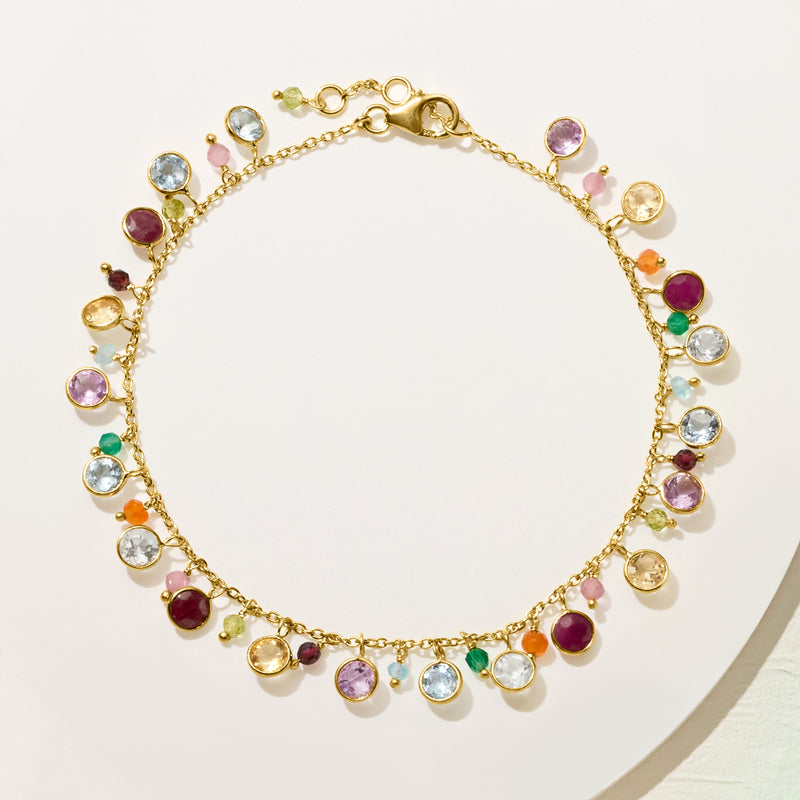 Gold-tone multi-gemstone drop anklet with round colorful stones on linked chain and clasp