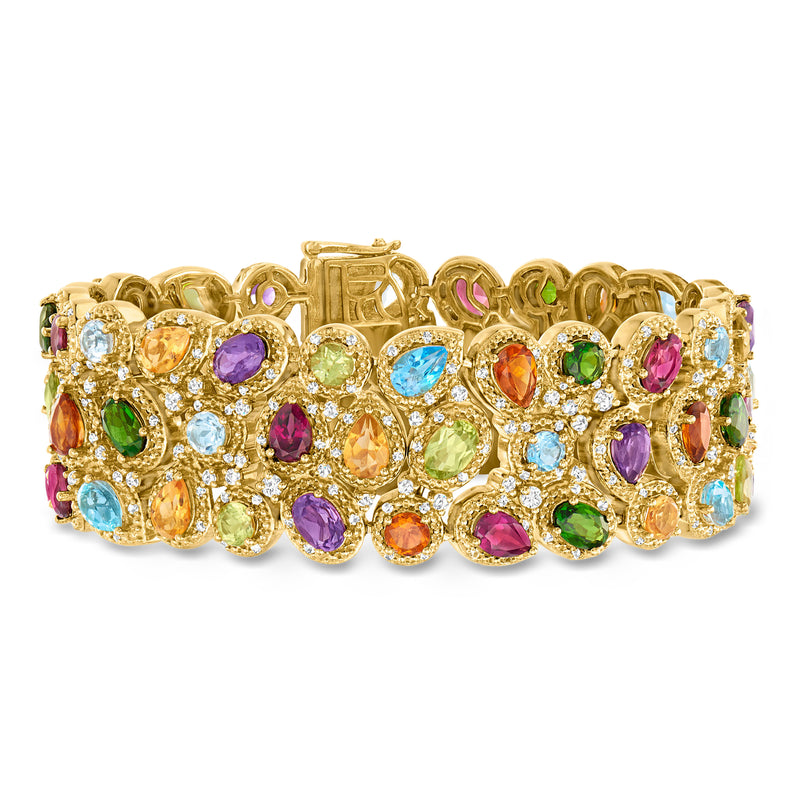 Gold-tone three-row gemstone bracelet with round multicolor stones in pave settings.