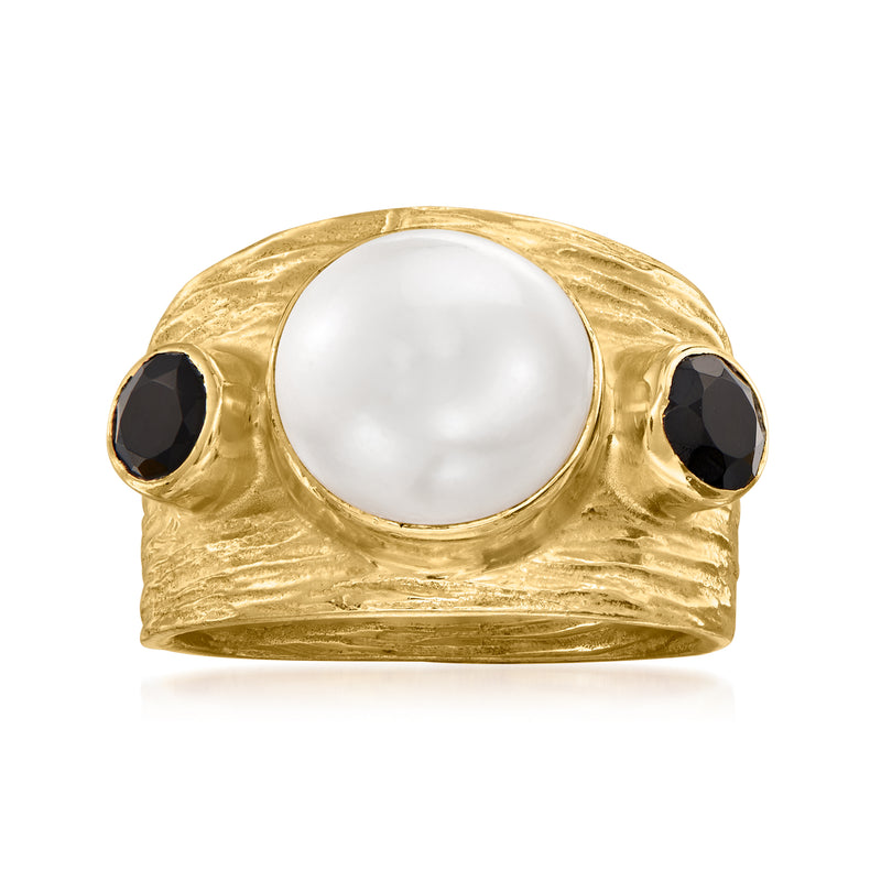 Gold-tone ring with large white cultured pearl center and dark onyx side stones