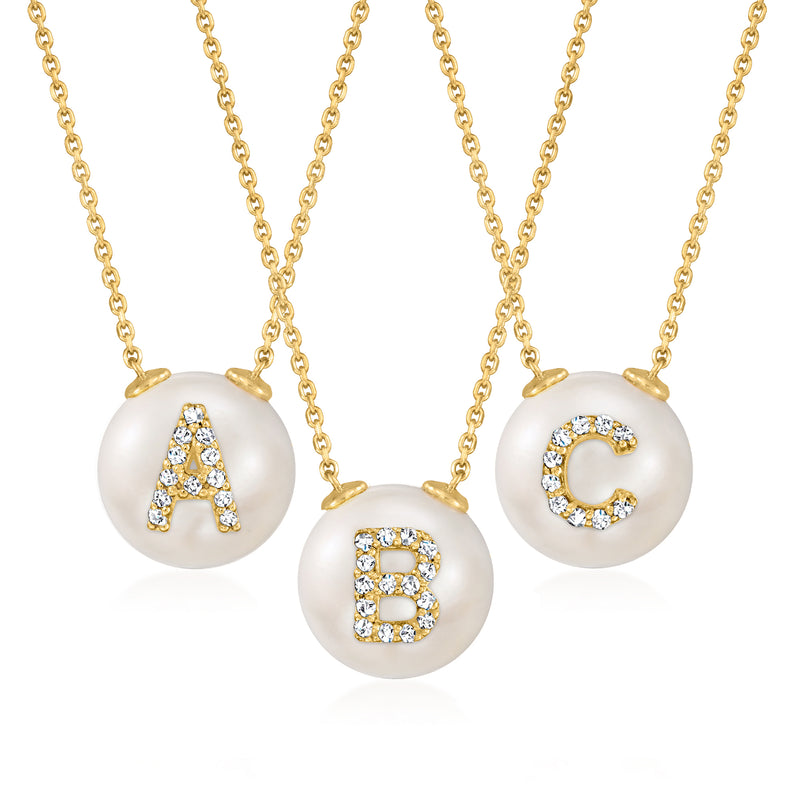 Yellow gold initial necklace with three pearl letter charms and diamond accents