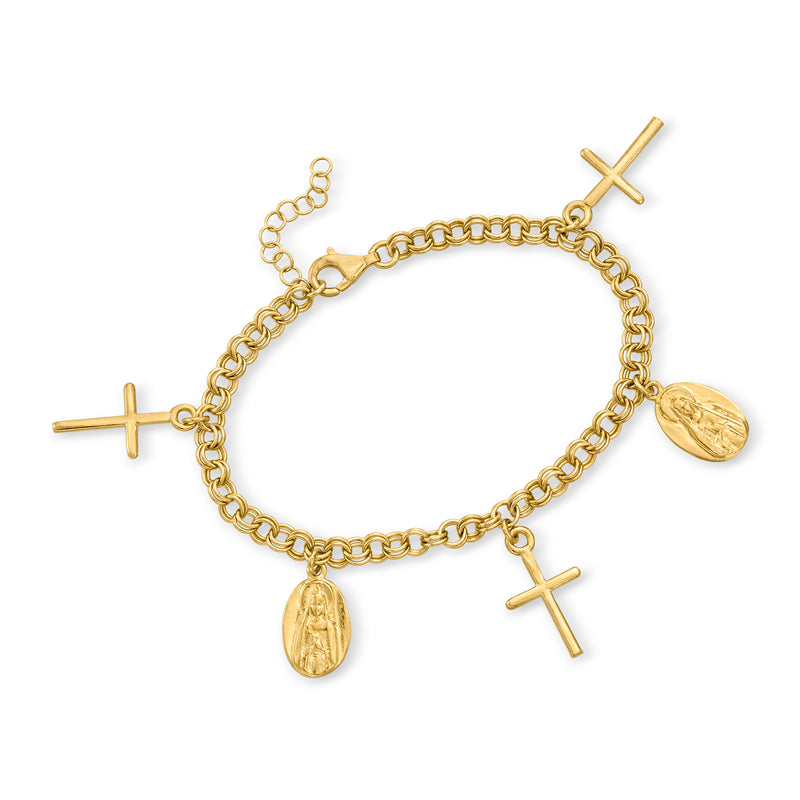 Gold charm bracelet with interlinked chain, three cross charms, and oval religious medallion.