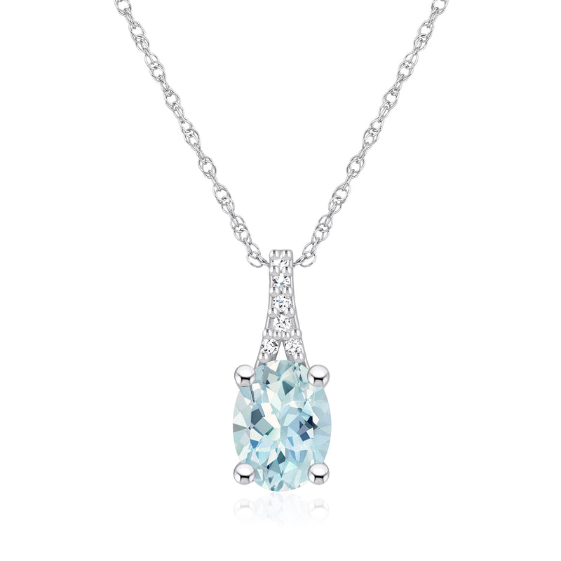 Aquamarine pendant necklace in 14kt white gold with oval aquamarine gemstone and diamond accents