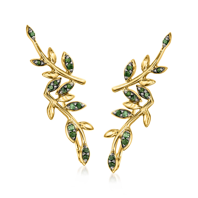 Gold ear climber earrings with green leaf-shaped stones and dangling branches