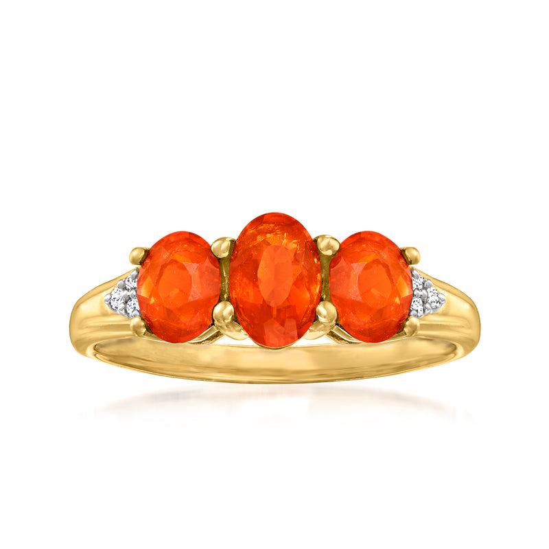 14kt yellow gold three-stone ring with oval orange fire opal and diamond accents