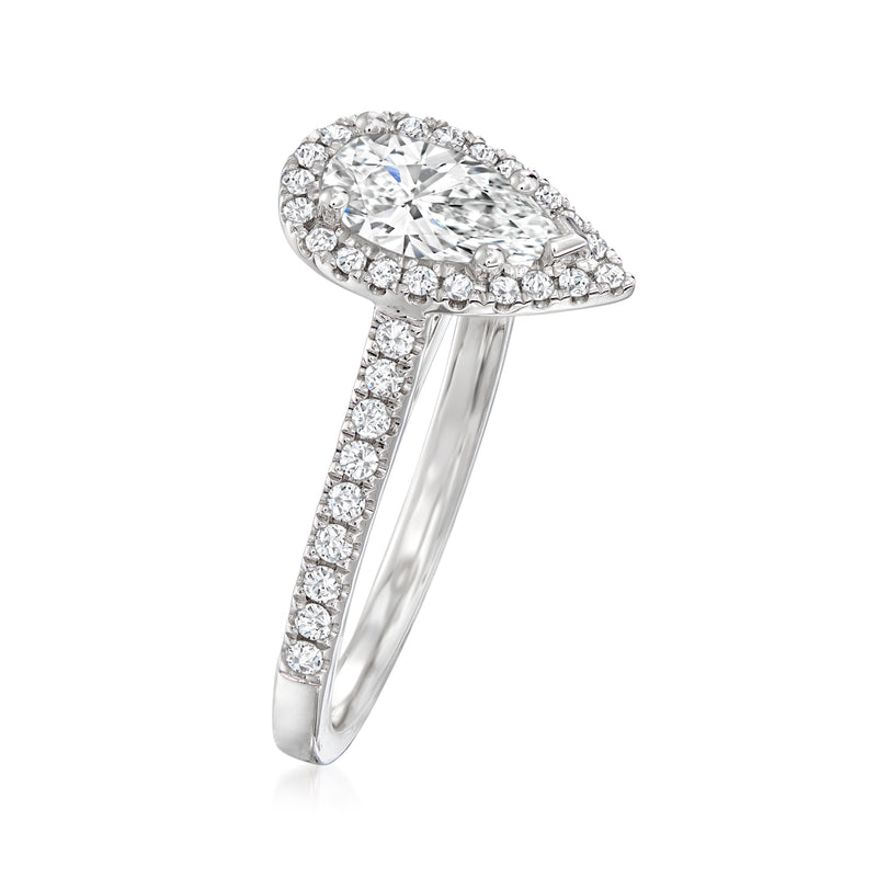 Diamond ring in 14k white gold with pear-shaped halo and pavé band