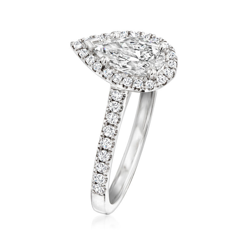 Pear-shaped diamond ring in white gold with pavé band