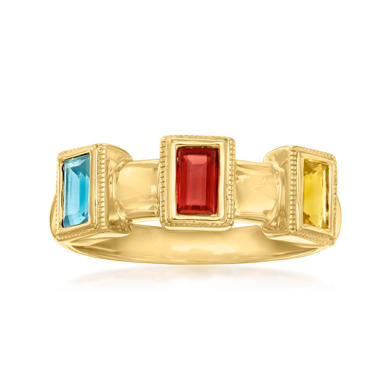 Three-stone gold ring with square-cut blue, red, and yellow gemstones in bezels