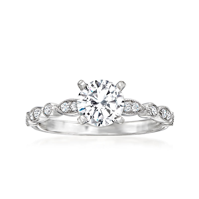 14kt white gold diamond engagement ring setting with round center stone and side halos