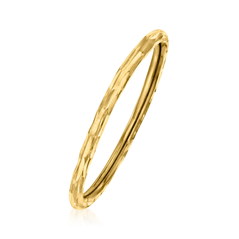 14kt yellow gold grooved band ring, angled side view