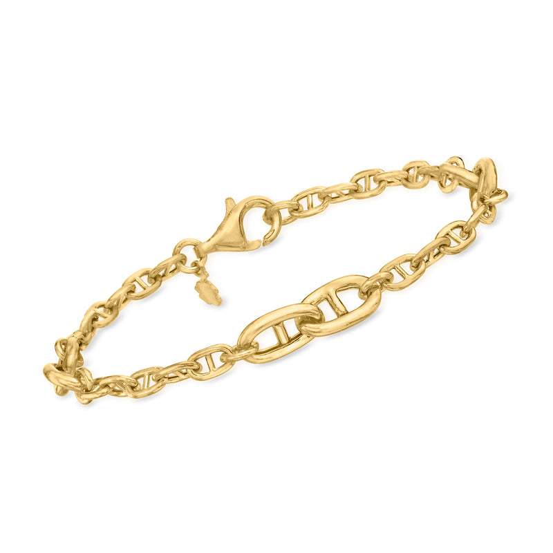 Gold-tone anchor-link bracelet with oval link details and lobster clasp