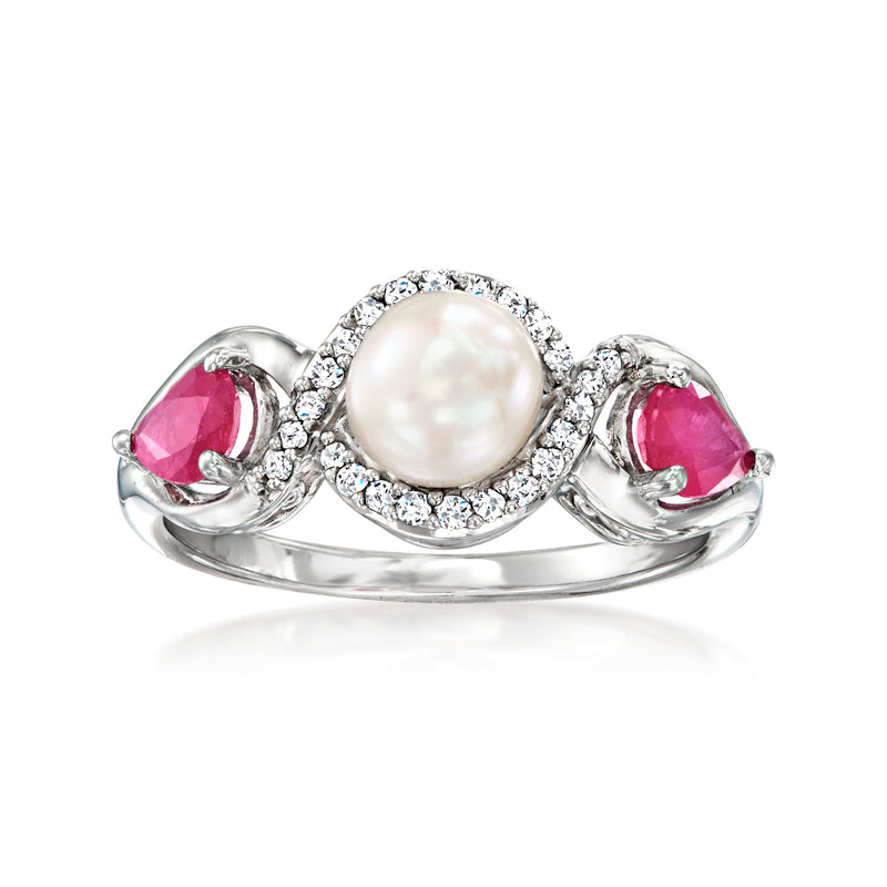 Sterling silver ring with round cultured pearl center, ruby side stones, diamond halo