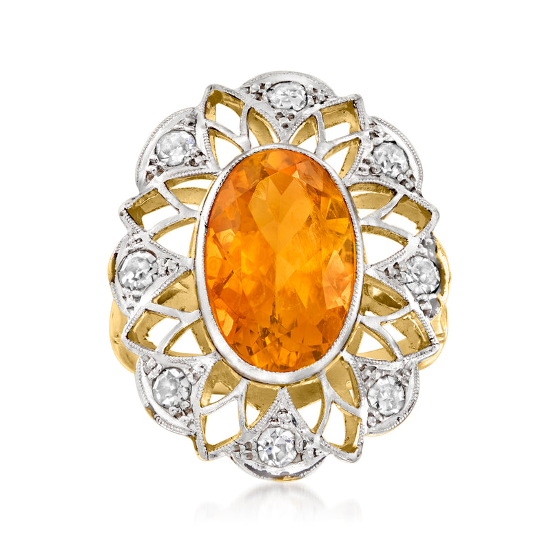 Vintage oval citrine halo ring in platinum and 18k yellow gold with diamond accents