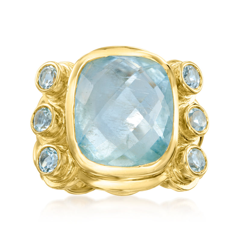 Aquamarine and sky blue topaz ring, gold over sterling, oval center with round blue stones