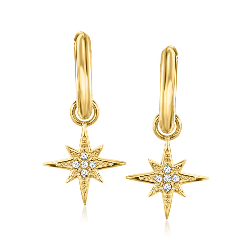Gold-tone huggie hoop earrings with dangling CZ starburst charms
