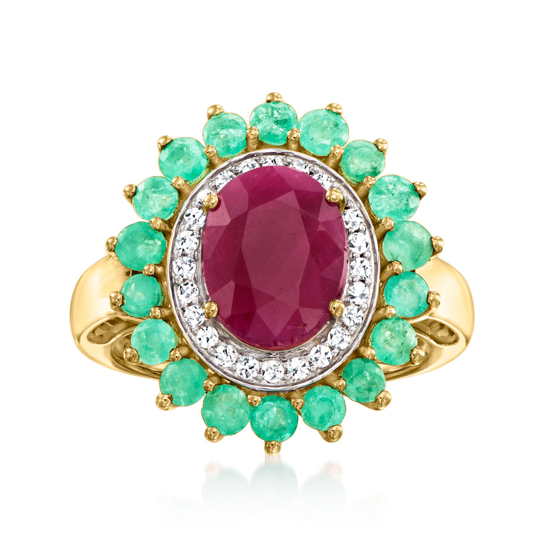 14kt yellow gold ring with oval ruby center, emerald halo, diamond border