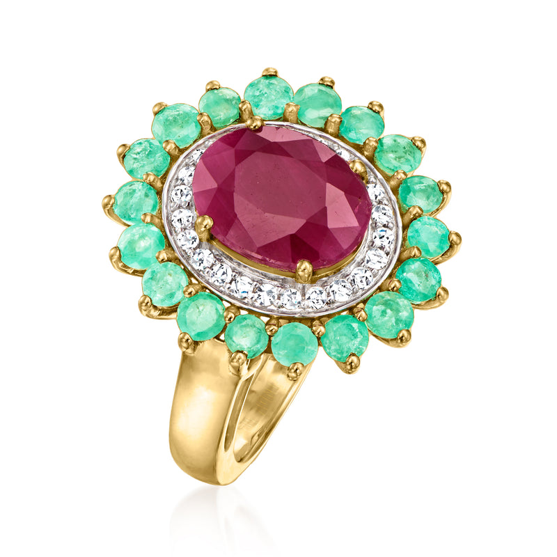 14kt yellow gold ring, oval ruby center with emerald clusters and diamond halo