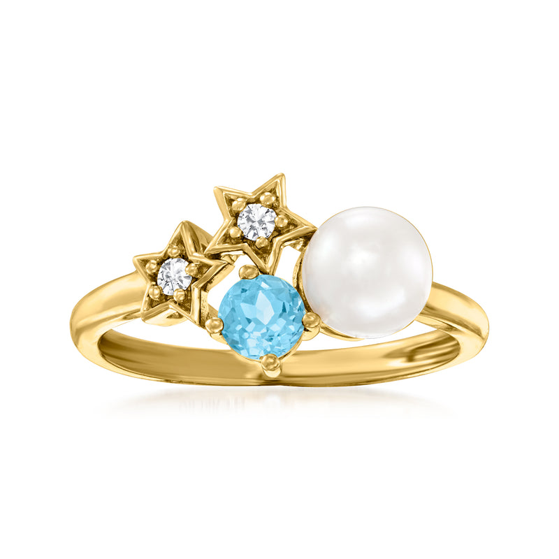 Yellow gold ring with white pearl, blue gemstone, and diamond accents