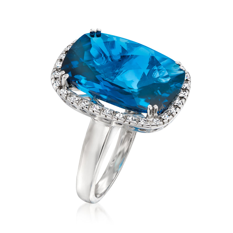 14kt white gold ring with side-set diamonds and cushion-cut London blue topaz