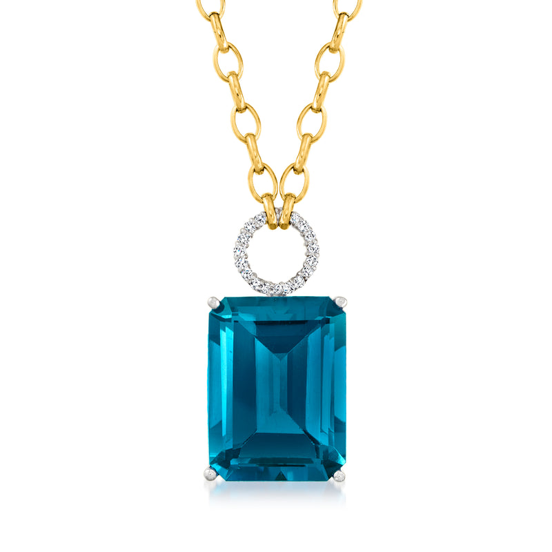 Two-tone gold necklace with large blue topaz pendant and diamond halo