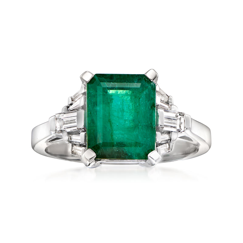 14kt white gold ring with emerald-cut emerald center and baguette diamond sides