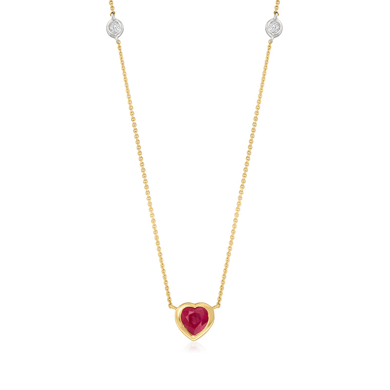 14kt yellow gold necklace with red heart ruby pendant and small diamond station accents