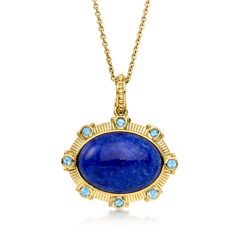 Gold pendant necklace with oval blue gemstone and small blue stones, cable chain