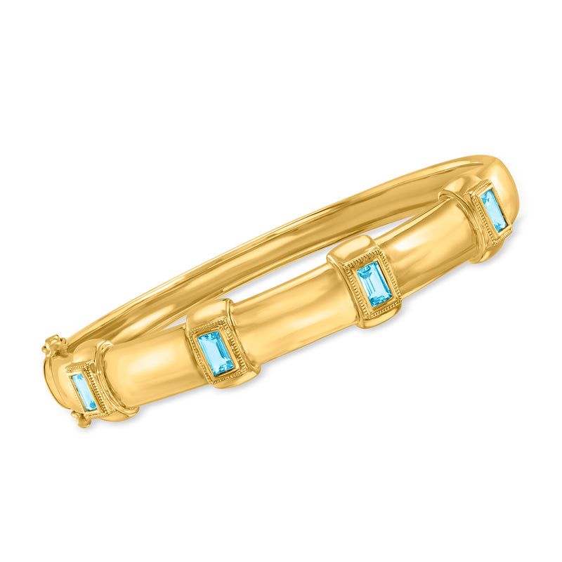 18k gold over sterling bangle bracelet with blue square topaz stones