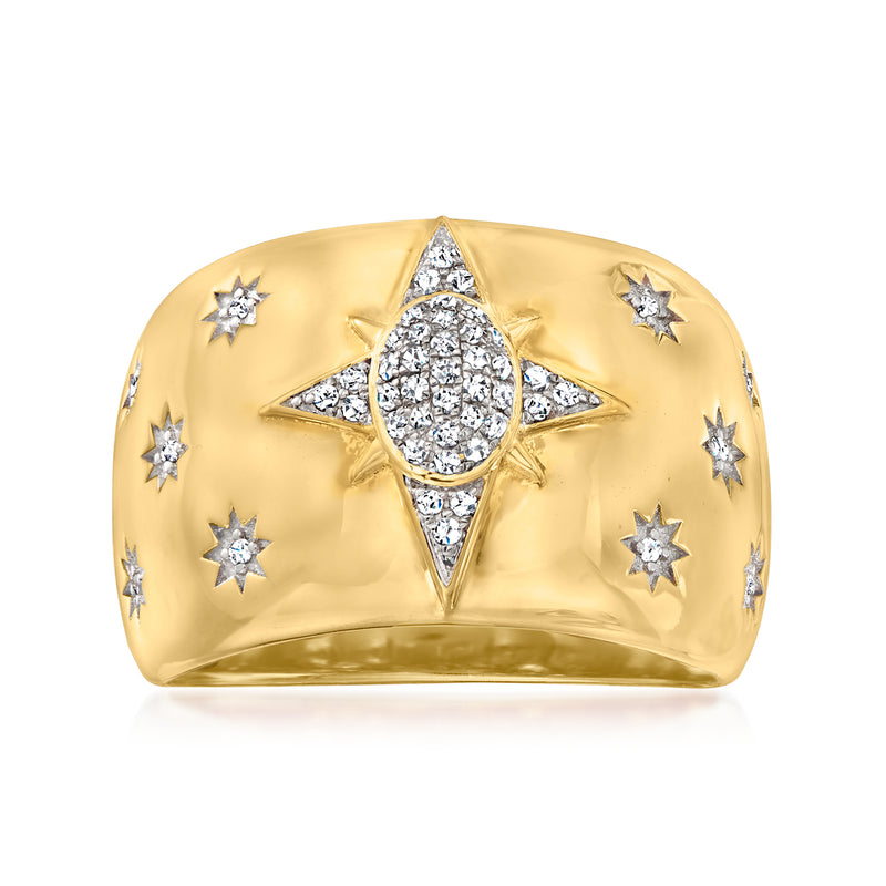 Gold dome ring with star accents and a central pear-shaped diamond cluster