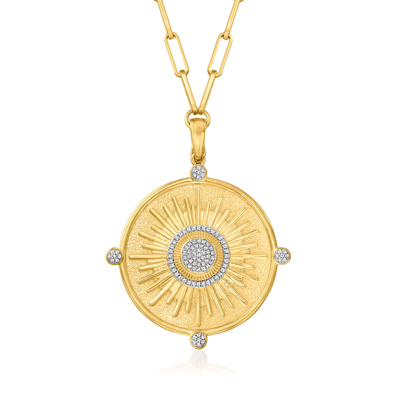 Gold sunburst medallion pendant necklace with round diamond center and side stones