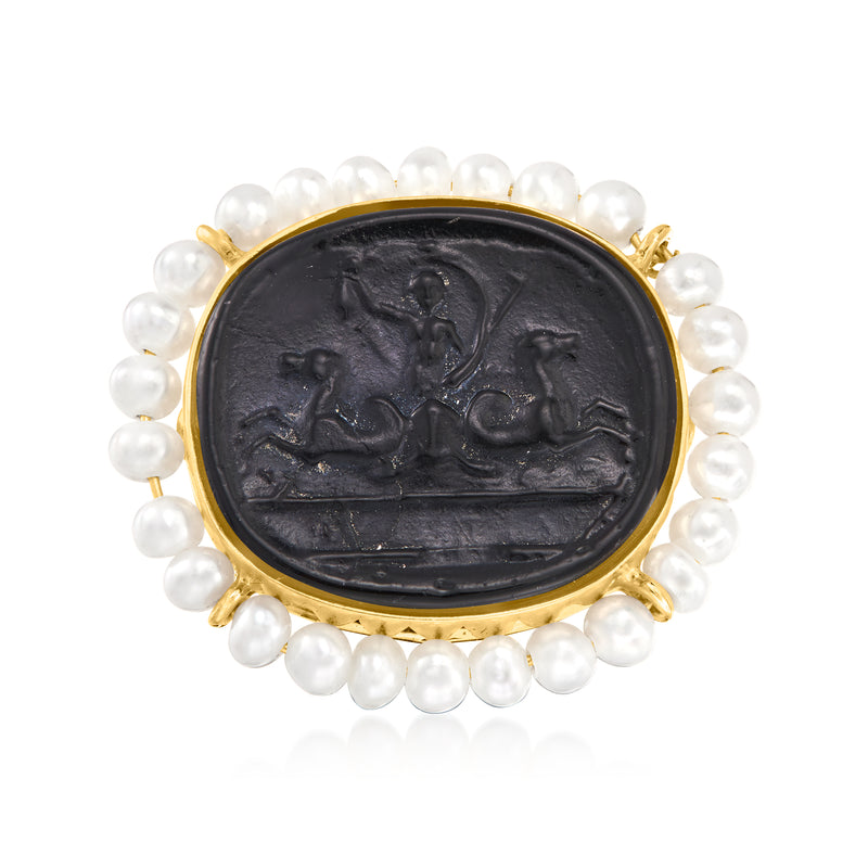 Black oval cameo-style ring with embossed figures, 18kt gold-tone frame and white pearls