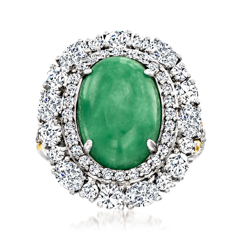 Two-tone sterling silver ring with oval green jade center and halo of clear stones