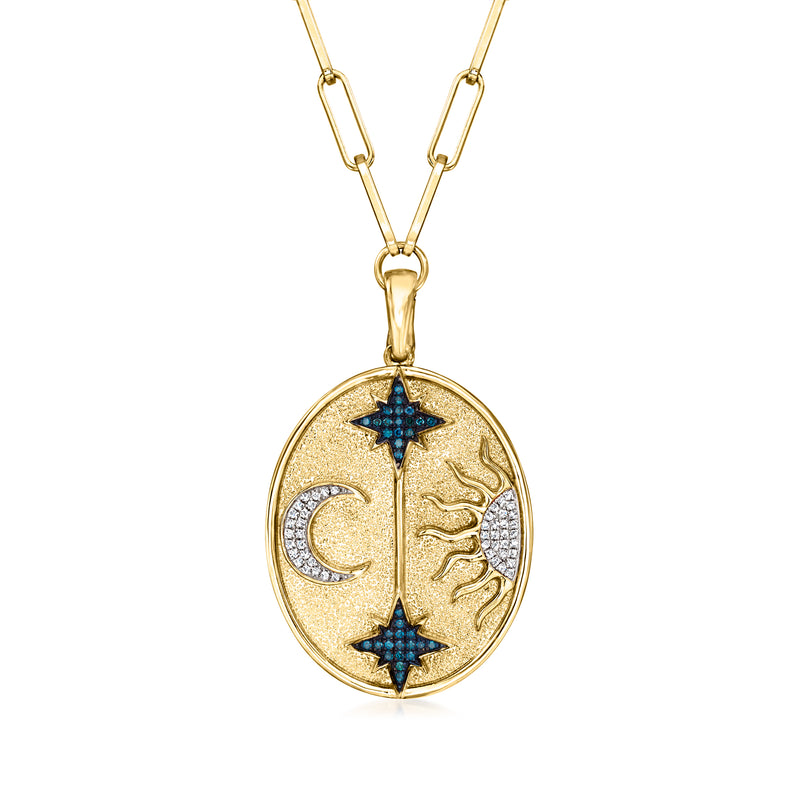 Gold-tone necklace with oval celestial pendant, blue stars, moon, and rhinestone sparkle