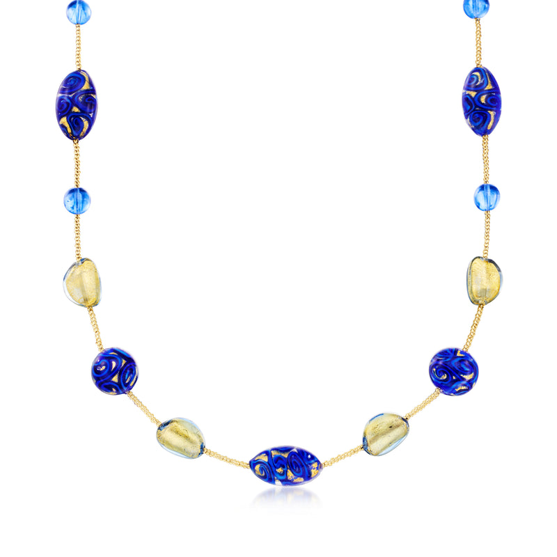 Gold-tone station necklace with blue Murano glass beads and oval gold accents