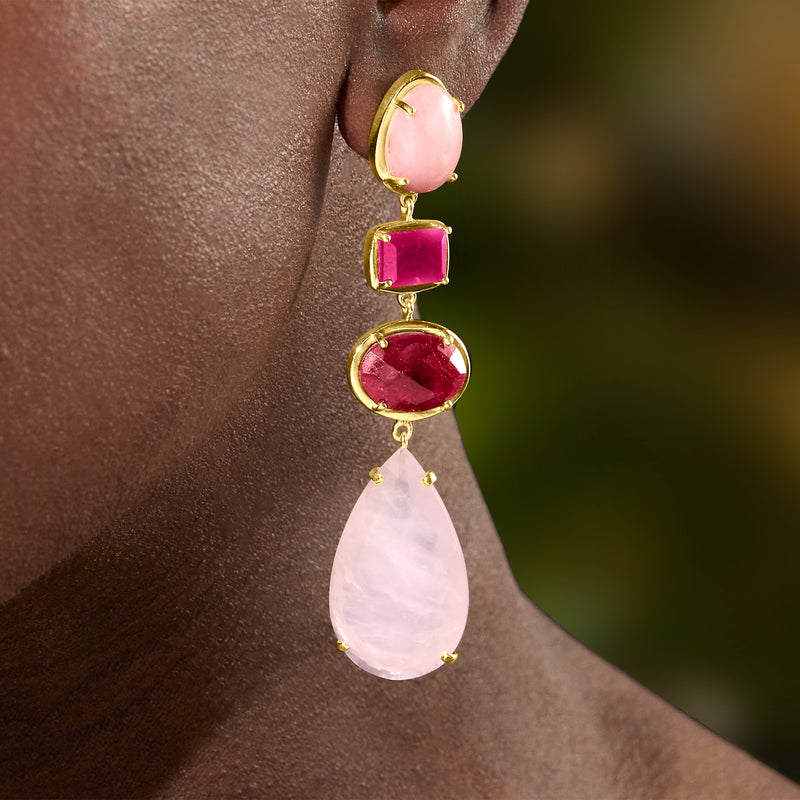 Gold drop earrings with pink oval, pink square, red round, and pear-shaped pink teardrop