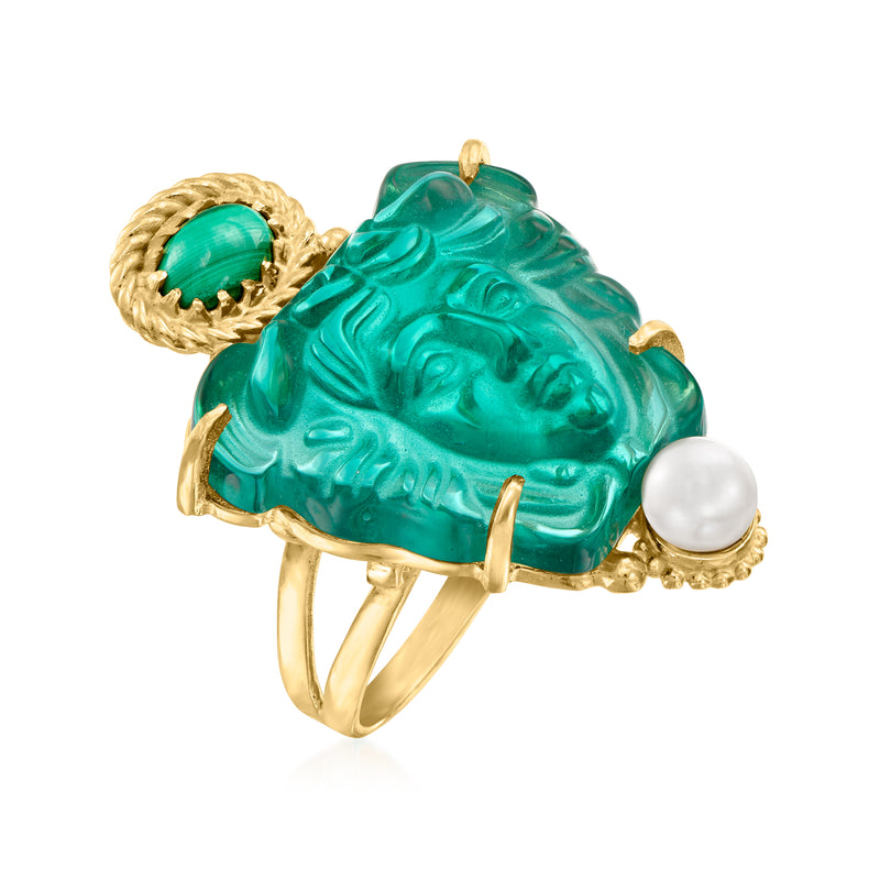Green Medusa head ring in gold with side pearl and open band