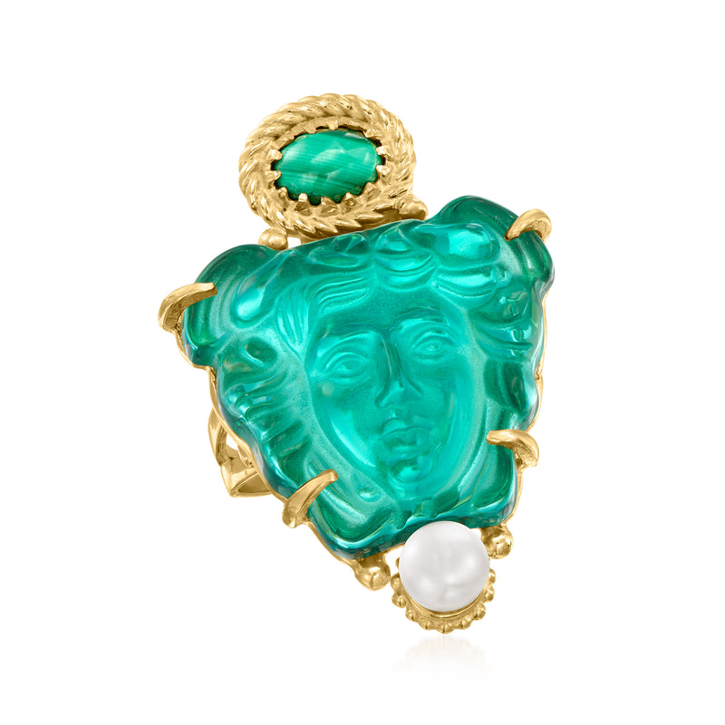 Green Medusa face ring with gold frame, small green bezel, and round pearl