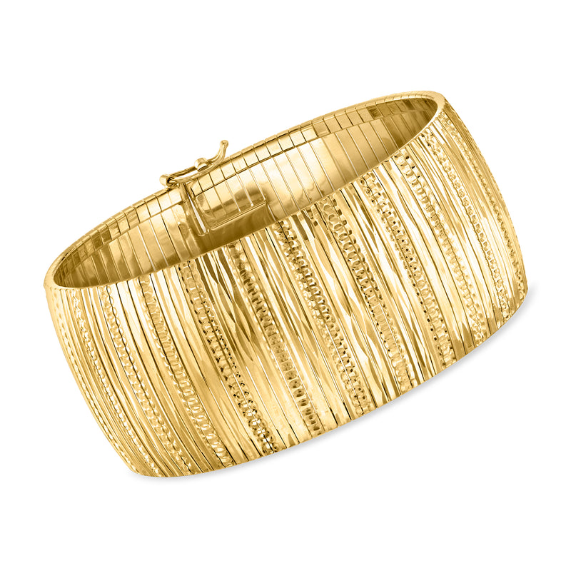Gold over sterling Omega bracelet with ridged panel design and hinged clasp