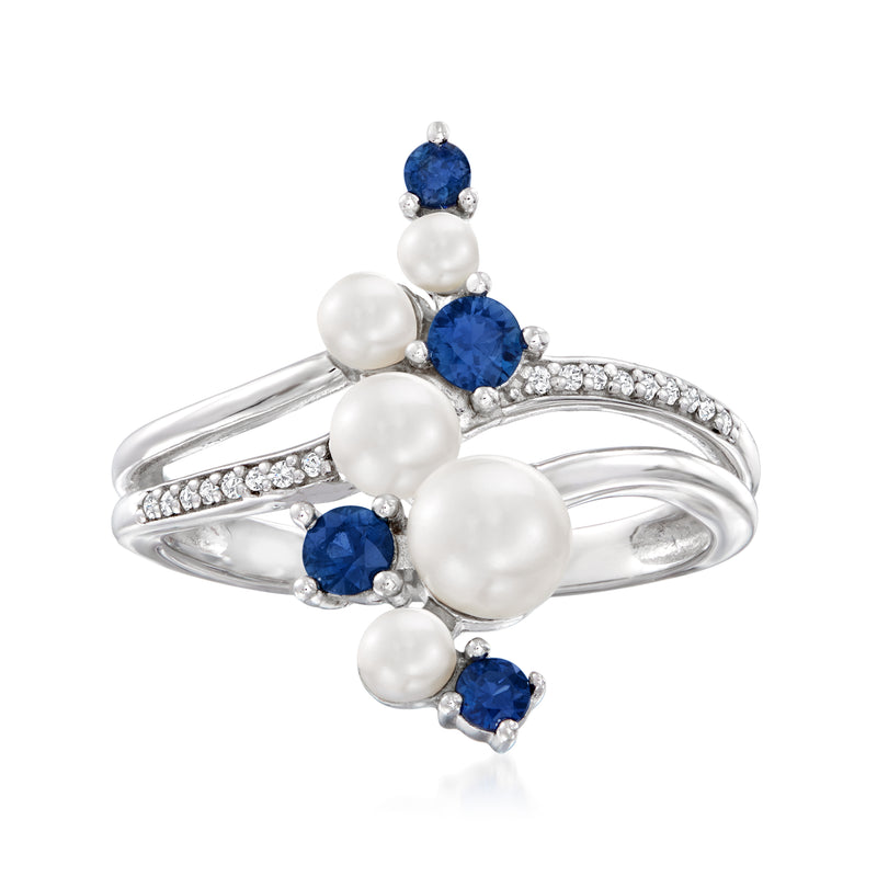 Sterling silver ring with cultured pearls and round blue sapphire accents, with pave band
